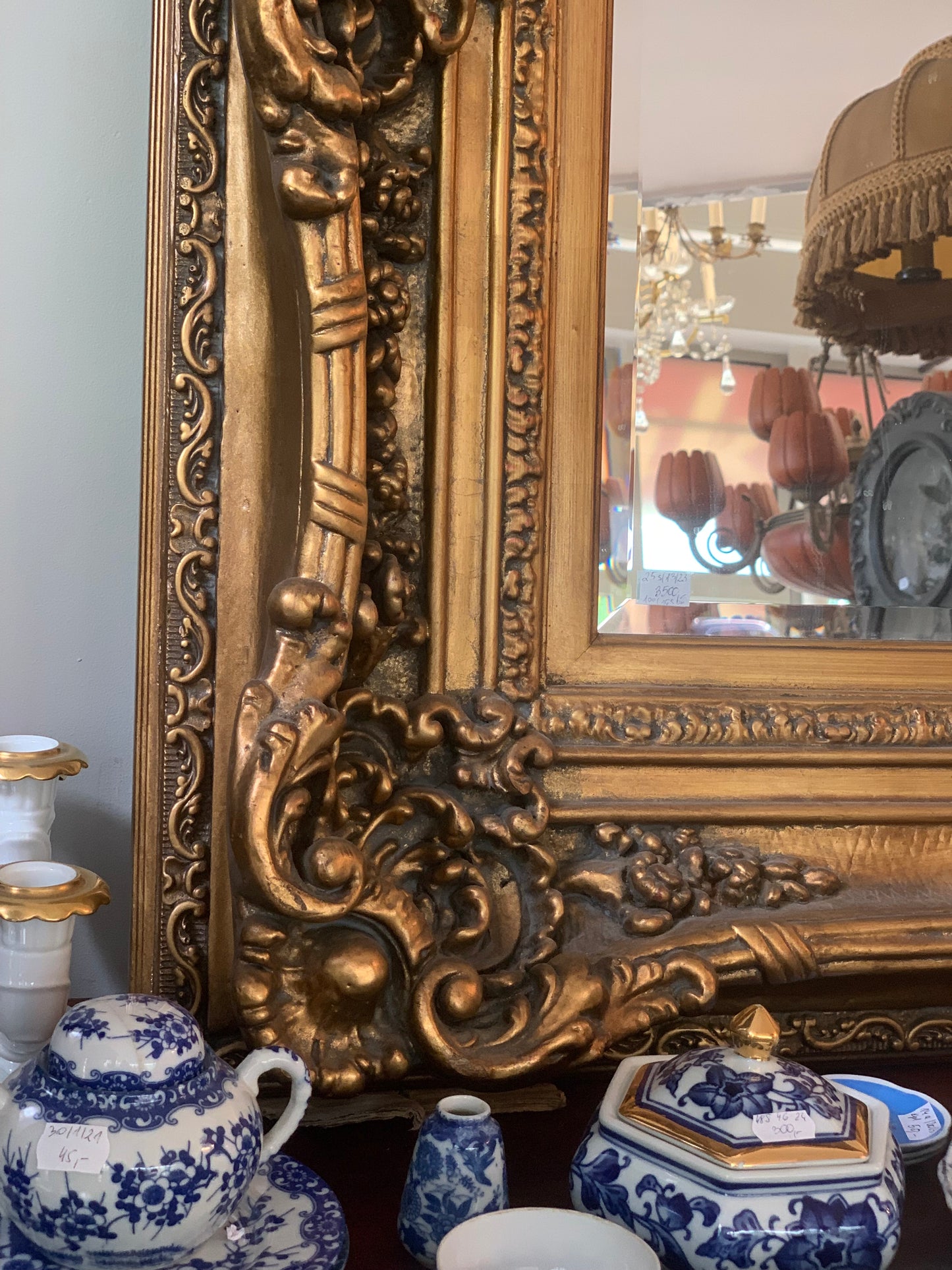 Large baroque mirror, beveled, gilded wooden frame