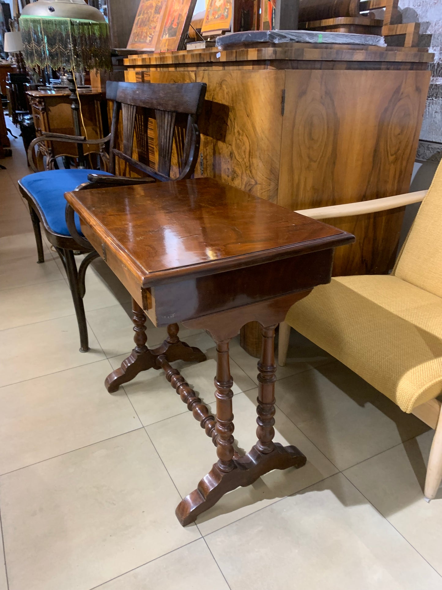 A table with a drawer, thread-like, eclectic