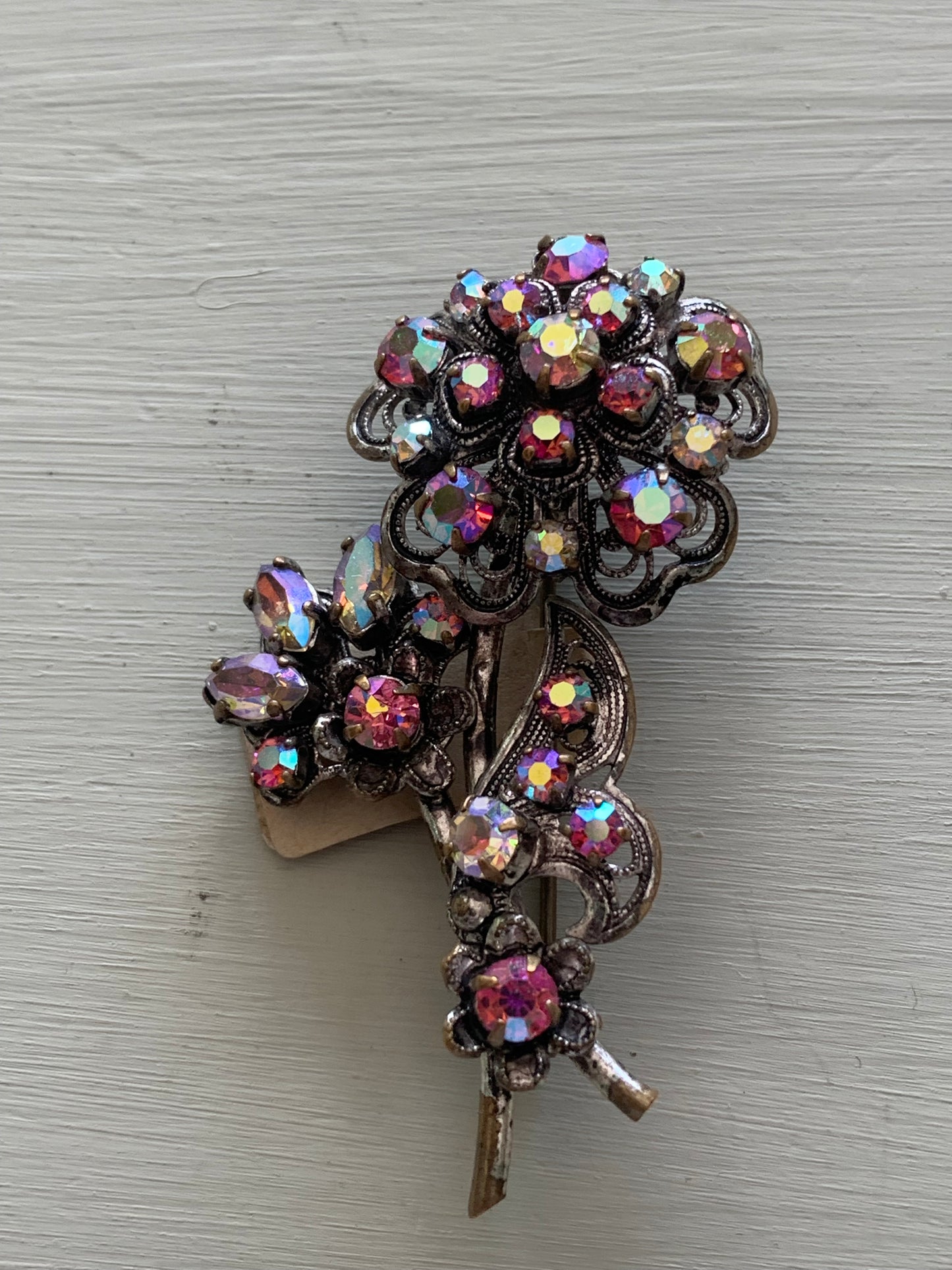 Broszka kwiat, metal, kolorowe cyrkonie