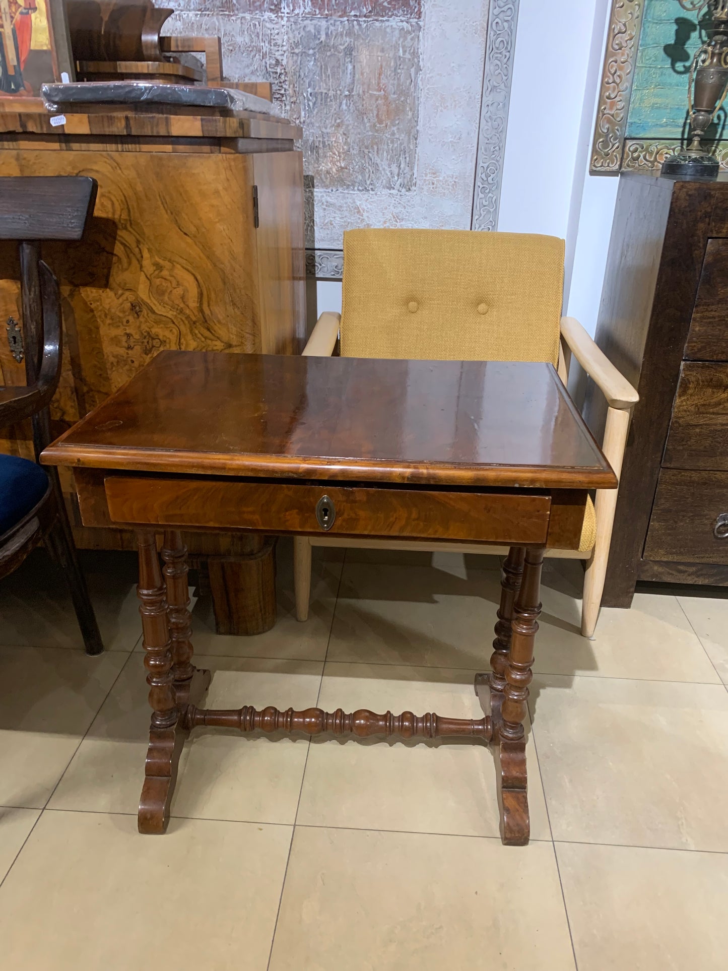 A table with a drawer, thread-like, eclectic