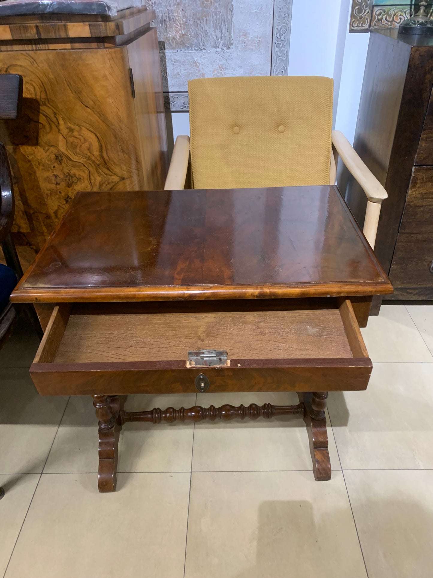 A table with a drawer, thread-like, eclectic