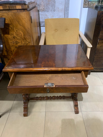 A table with a drawer, thread-like, eclectic