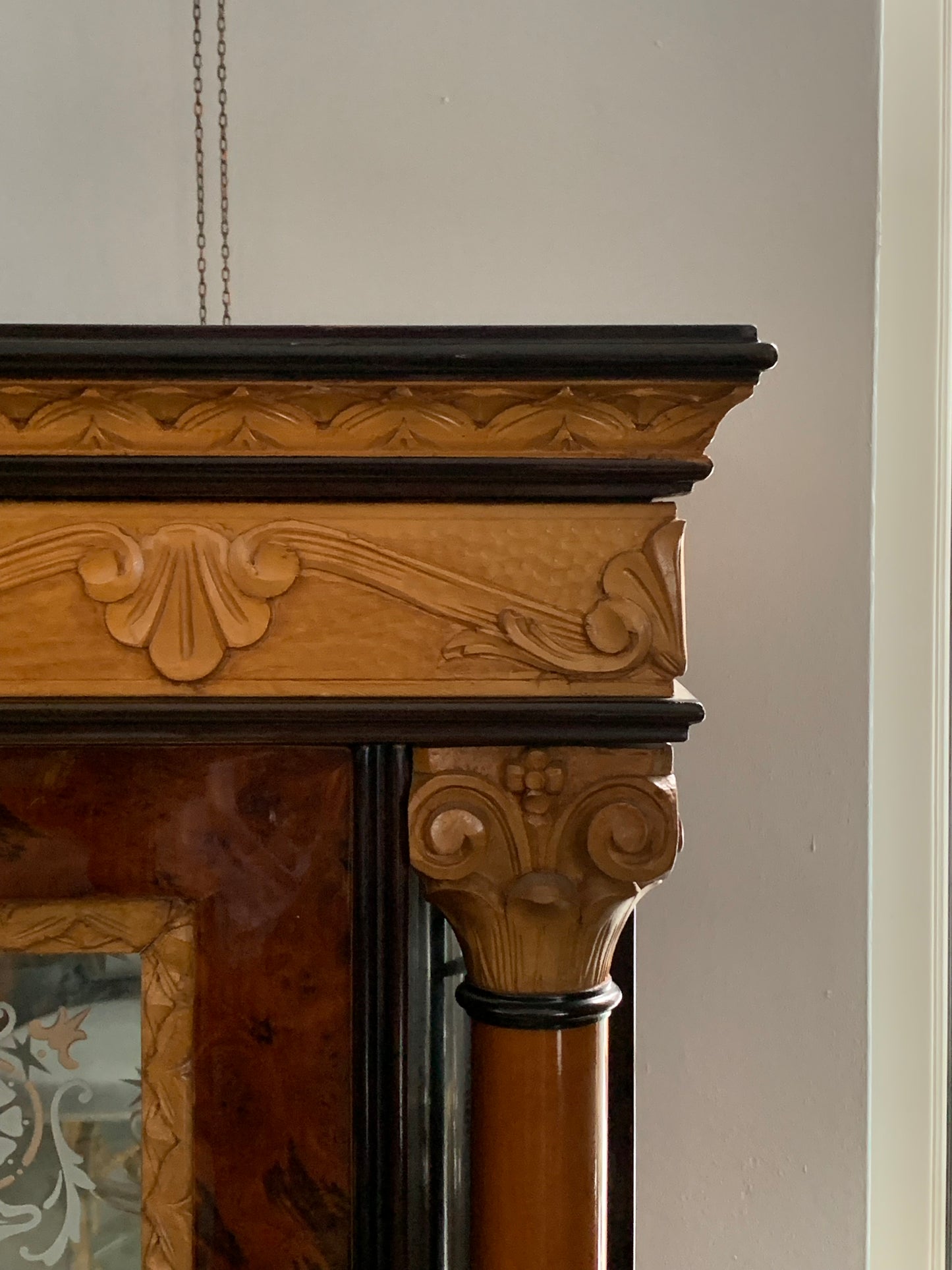 Walnut display cabinet in Empire style