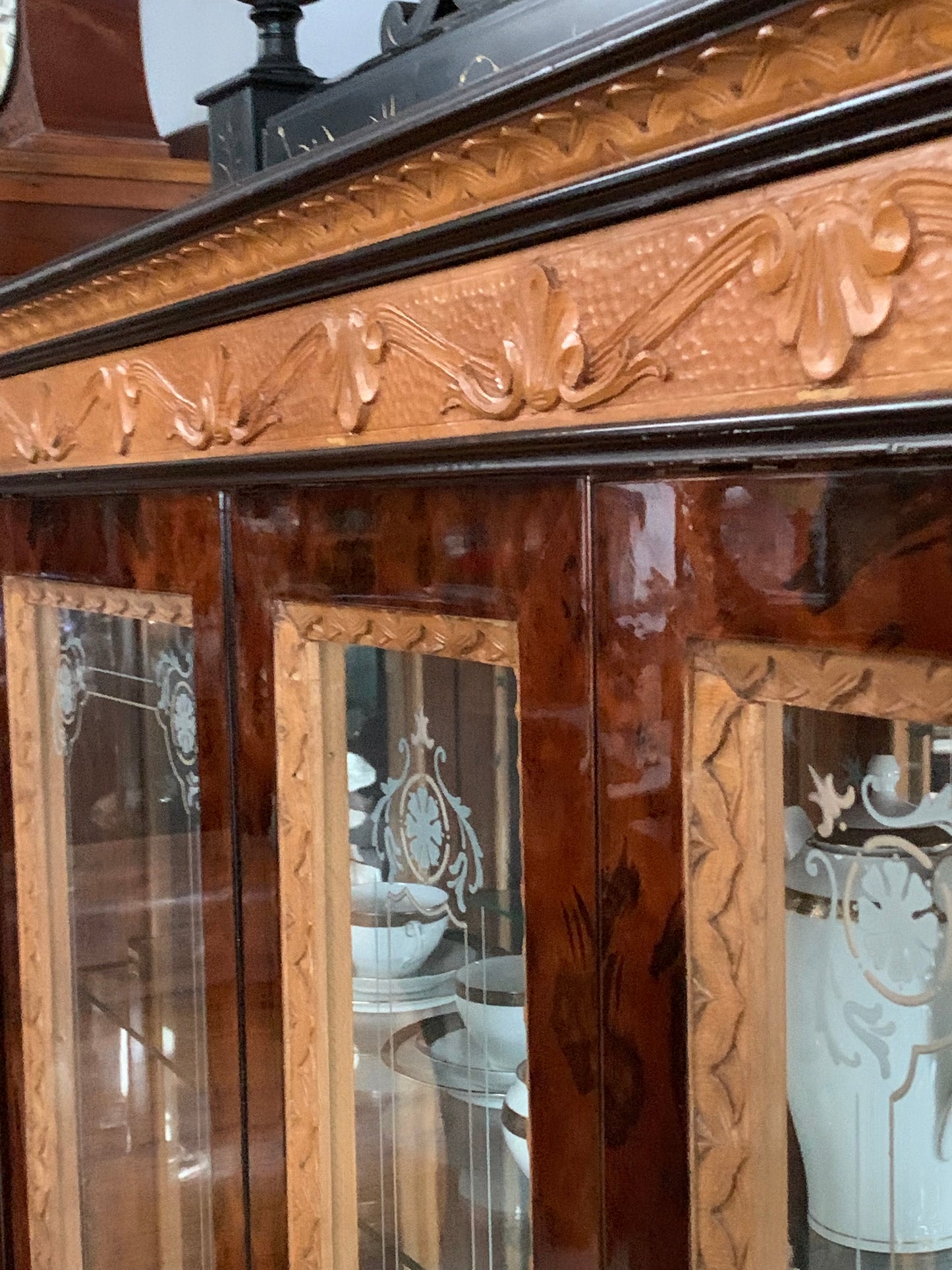 Walnut display cabinet in Empire style