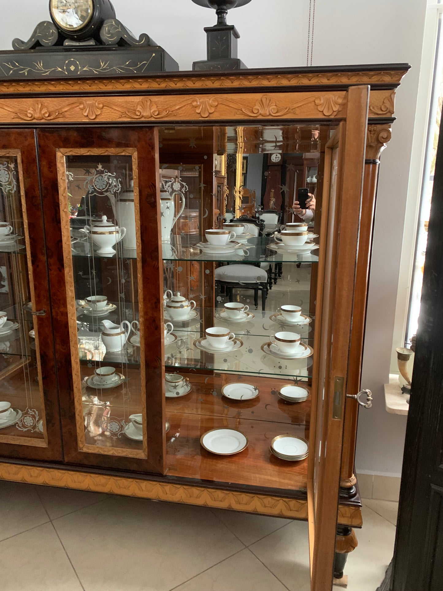 Walnut display cabinet in Empire style